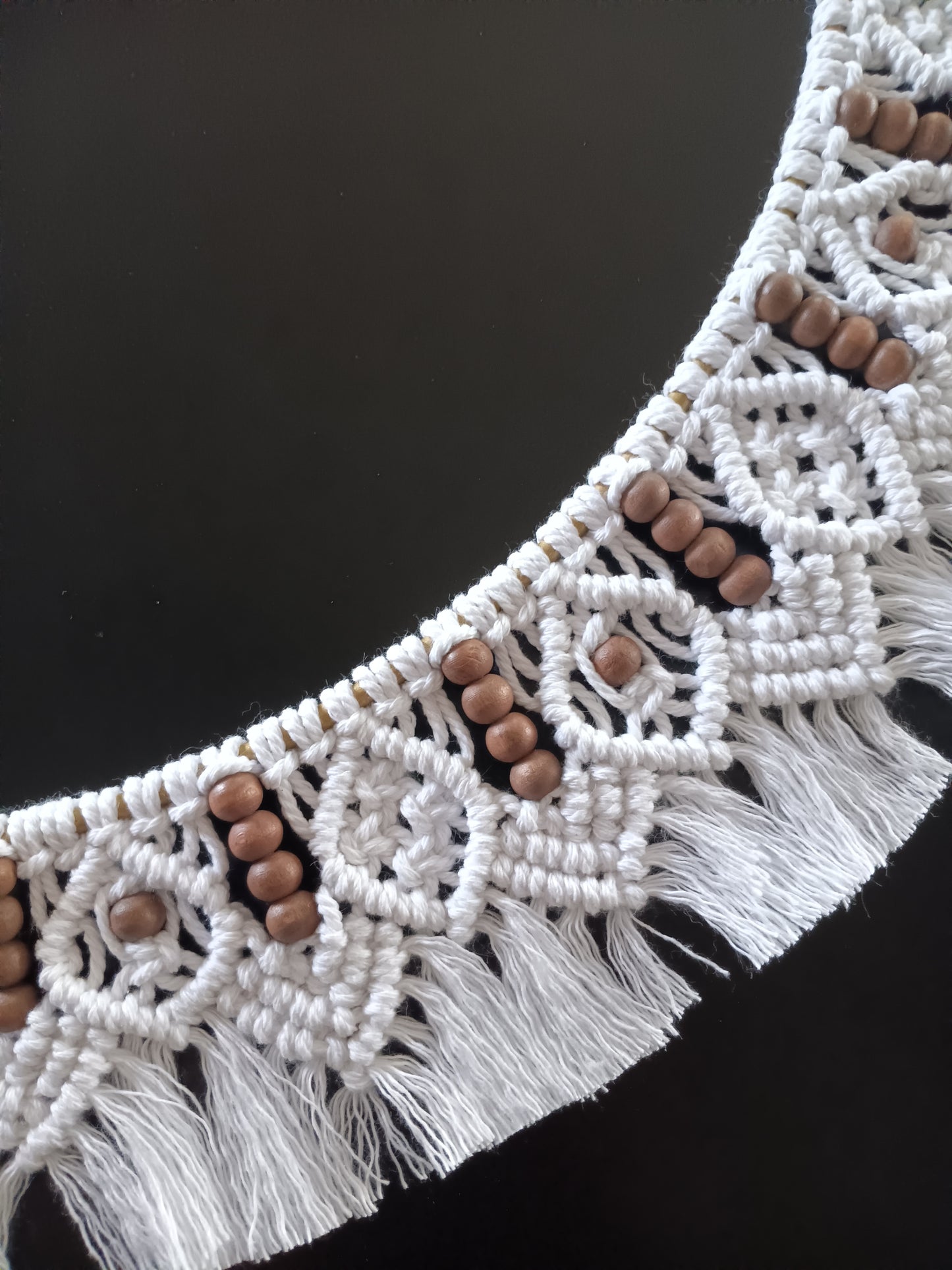 White and dark brown beaded macrame mandala