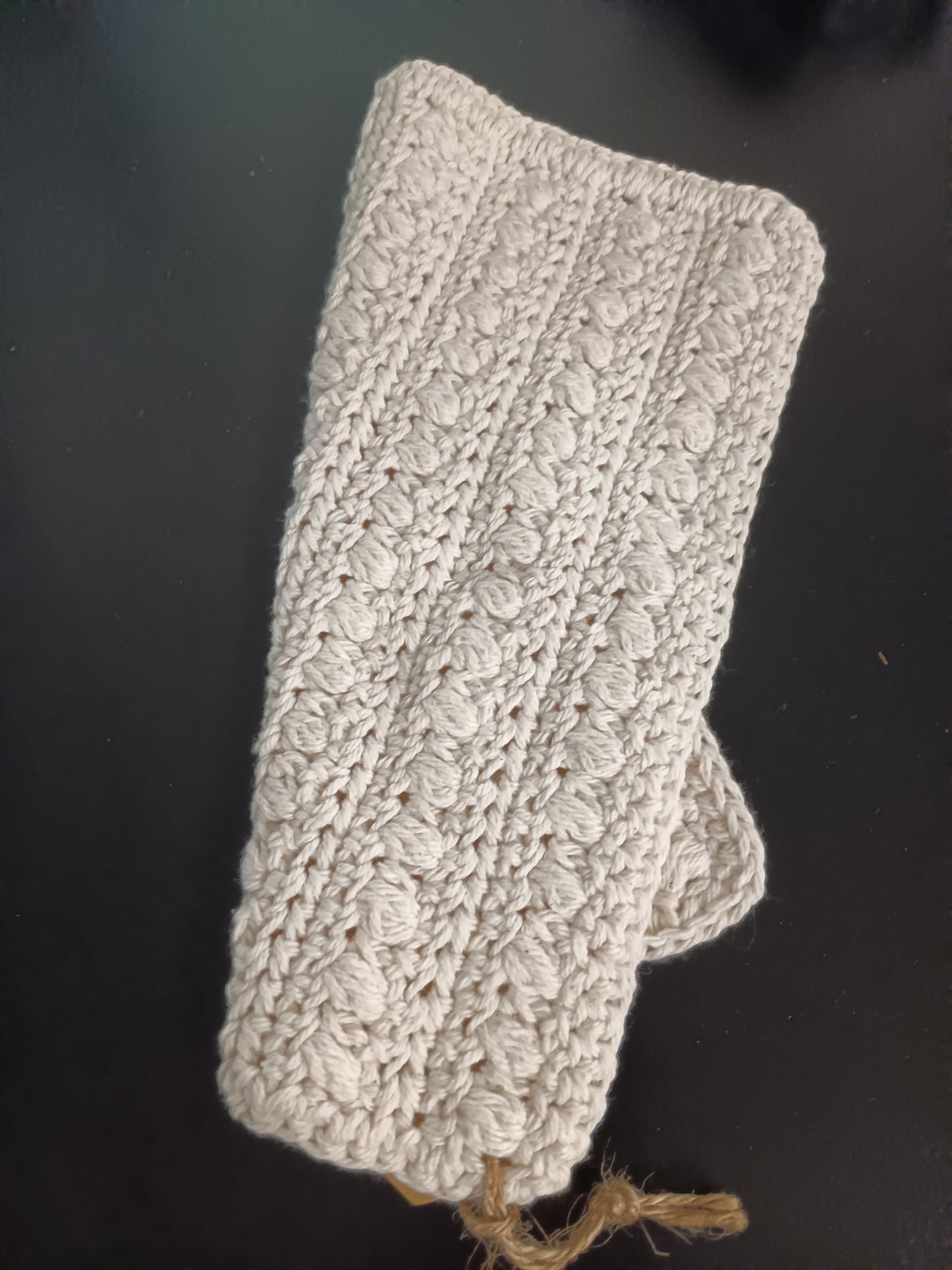 thick cream colored dish cloth