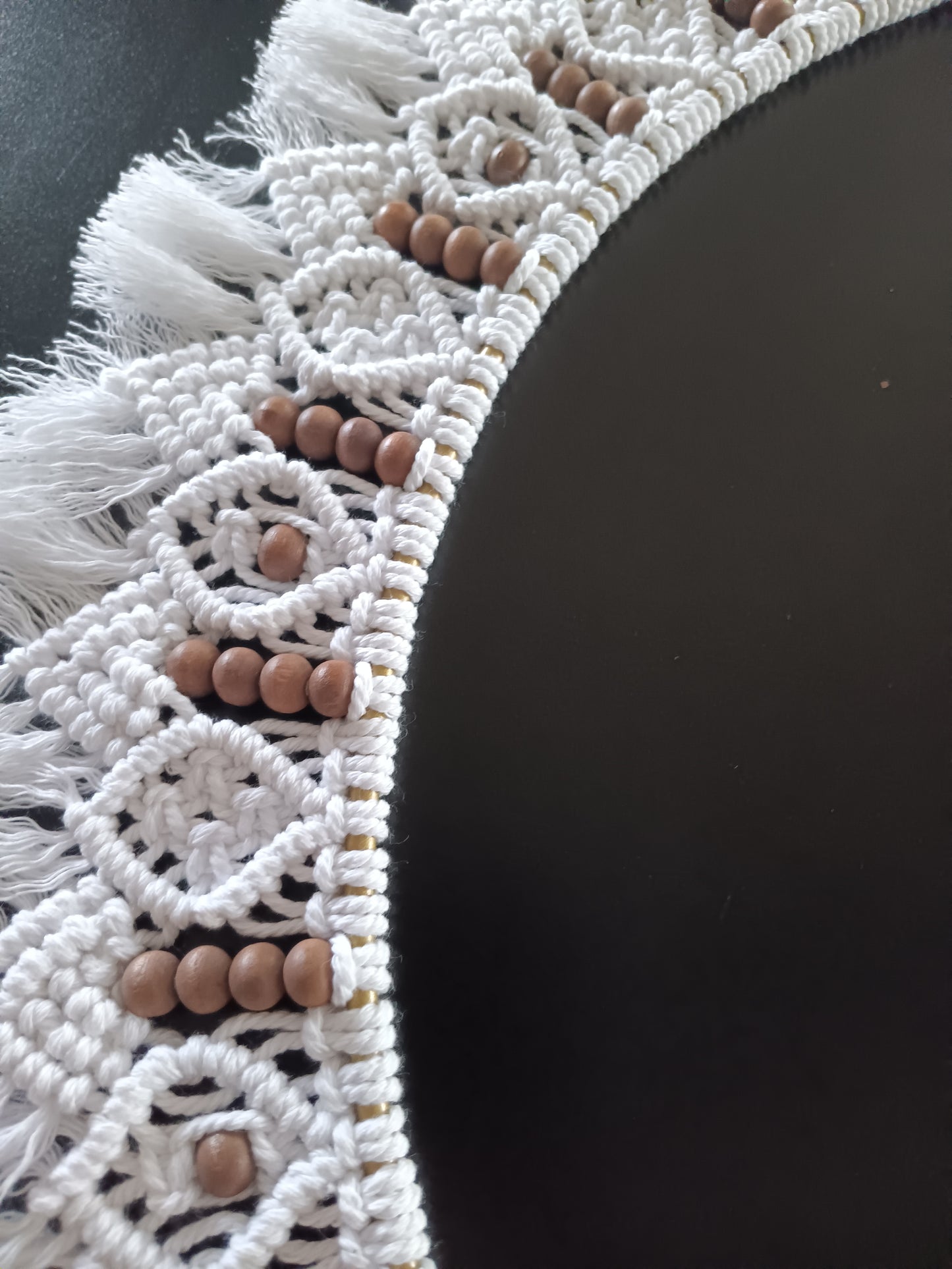 White and dark brown beaded macrame mandala